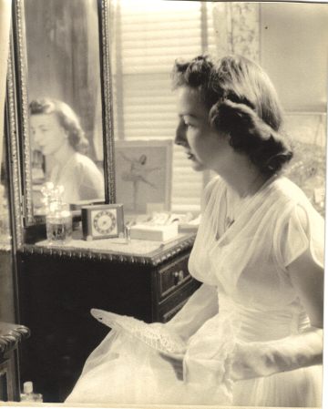 Mom looking in mirror